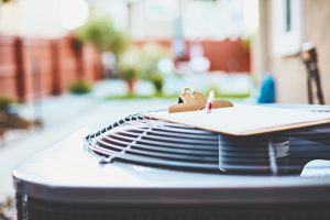 outdoor-ac-unit-with-clipboard-on-top